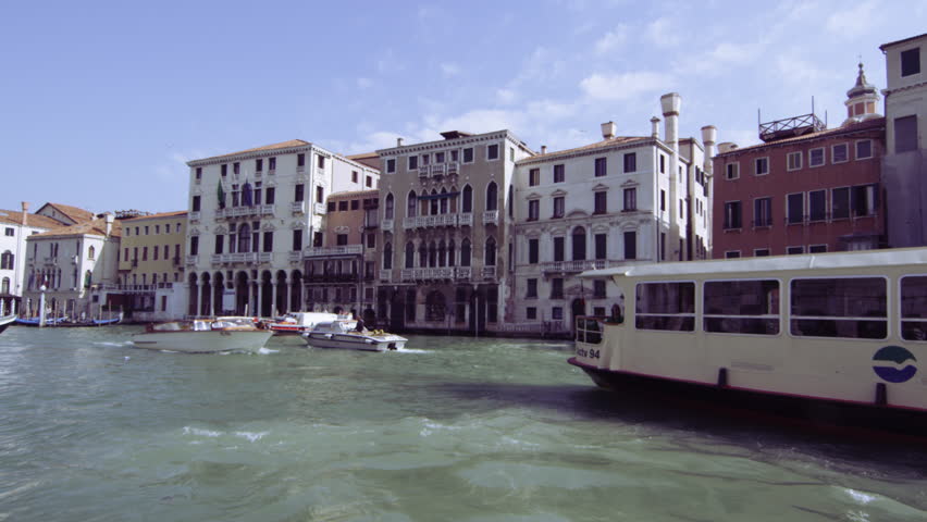 VENICE, ITALY - MAY 4, 2012: Sped up footage of motor boats on Grand Canal