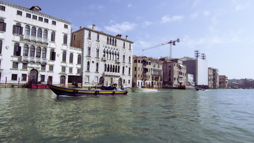 VENICE, ITALY - MAY 4, 2012: Tracking shot from boat on Grand Canal