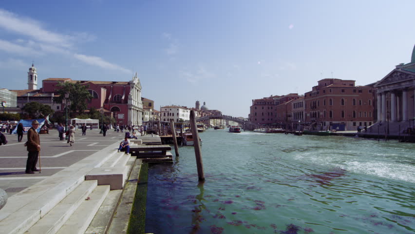VENICE, ITALY - MAY 4, 2012: Slow motion tracking shot of boat travel on the