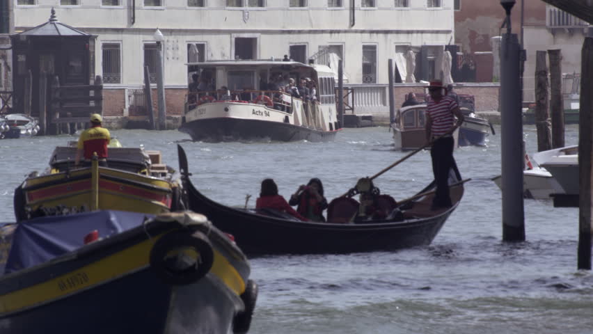 VENICE, ITALY - MAY 4, 2012: Slow motion footage of tourists traveling on a