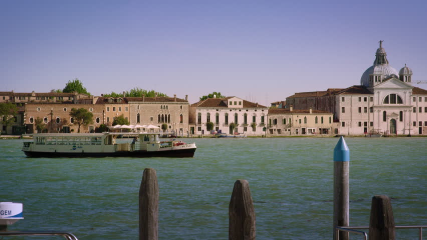 VENICE, ITALY - MAY 3, 2012: Panning shot of Giudecca across the canal from a