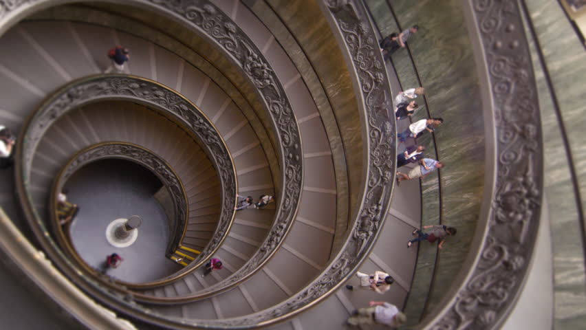 ROME, ITALY - MAY 5, 2012: Vertical rotating shot of large spiral staircase in