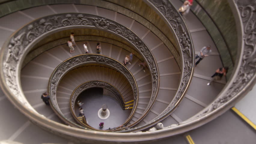 ROME, ITALY - MAY 5, 2012: Time-lapse of tourists on large spiral staircase
