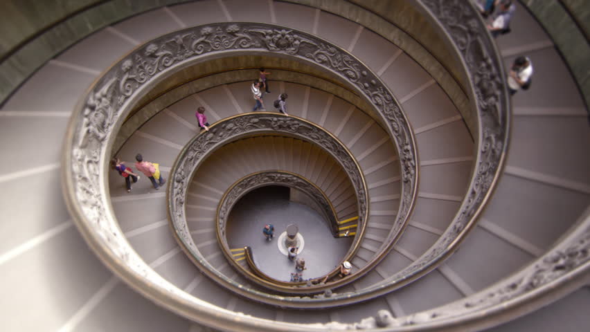 ROME, ITALY - MAY 5, 2012: Slow motion descent down large spiral staircase