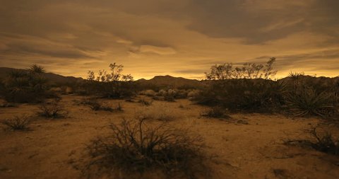 4K Desert Sunset Time-lapse switches to night sky full of beautiful stars in the galaxy. Shot in Joshua Tree, California. Amazing high resolution. 