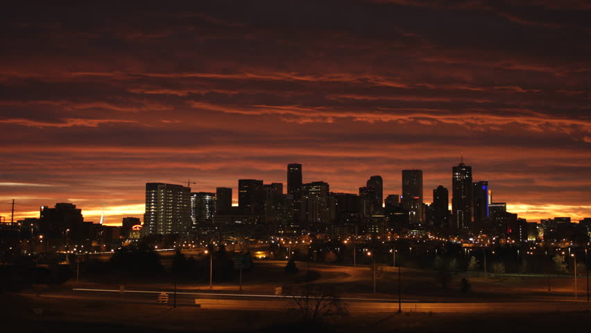 Timelapse of the Downtown Denver skyline before sunrise, with beautiful orange
