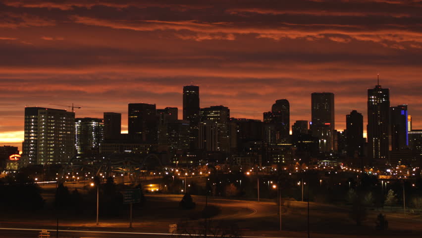 Timelapse of the Downtown Denver skyline before sunrise, with beautiful orange