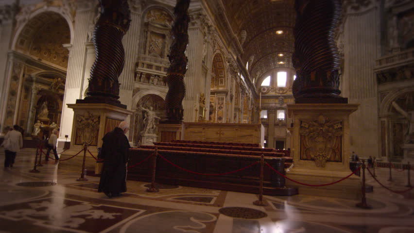 ROME, ITALY - MAY 8, 2012: Monk walks to Bernini's Baldacchino.