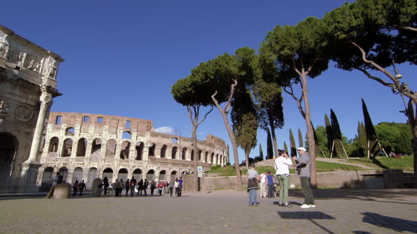 ROME, ITALY - MAY 6, 2012: Slow motion pan toward the Arch of Constantine and