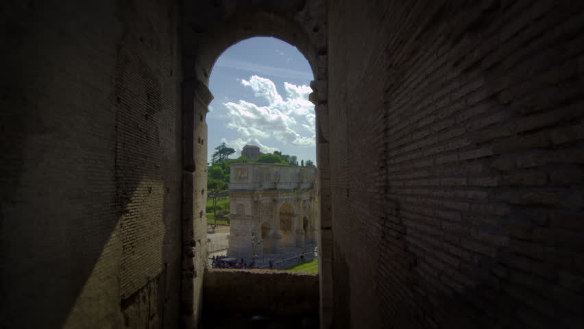 ROME, ITALY - MAY 6, 2012: View of the Arch of Constantine framed by a window in