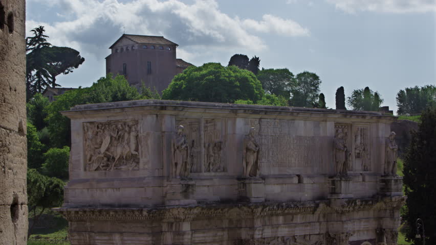 ROME, ITALY - MAY 6, 2012: The top of the Arch of Constantine from the Colosseum