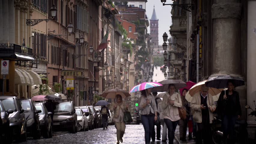 ROME, ITALY - MAY 7, 2012: A drizzling day in a Roman street