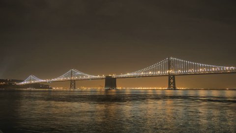 San Francisco, California - November 29, 2013 - 4k resolution time lapse of the San Francisco Bay Bridge lit up at night.