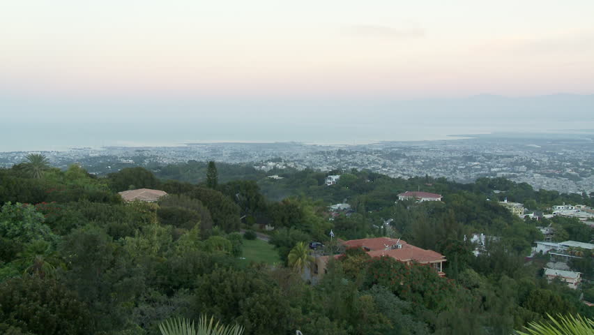 Port-au-Prince, Haiti - Jan 2009:  Wide pan across the Haitian capital city of Port-au-Prince.  Mountains are just visible through morning mist.