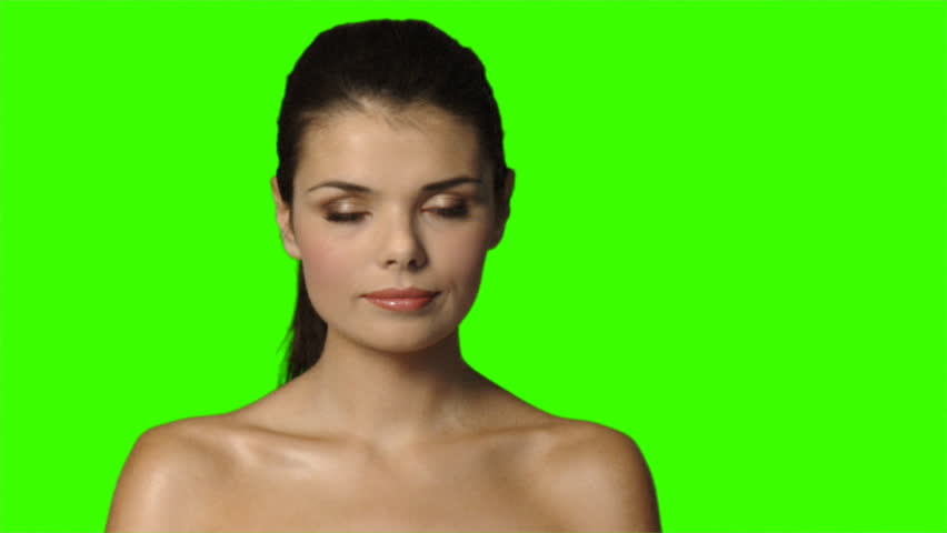 Portrait of beautiful and sexy woman on green screen 
