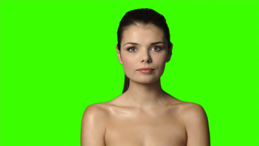 Sexy woman on green screen is shaking her finger 