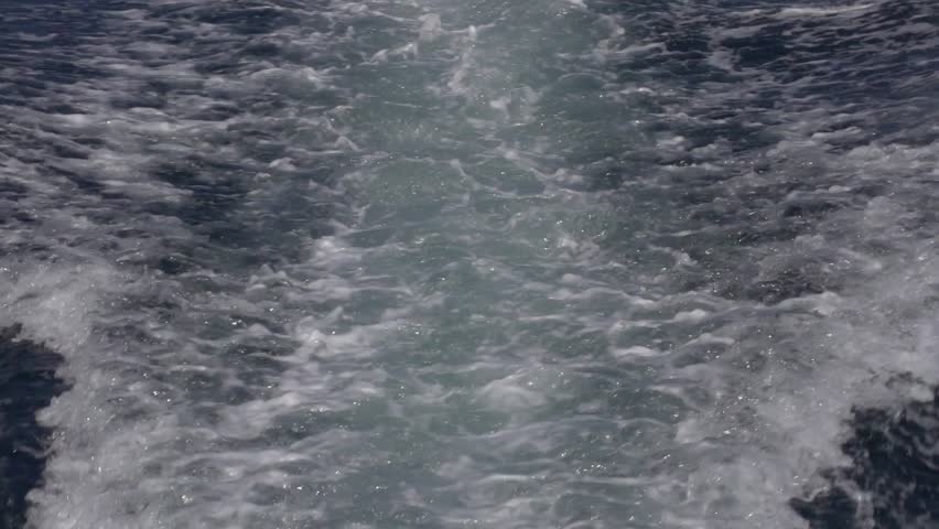 wake behing boat, slow motion shot, tahiti, pacific ocean