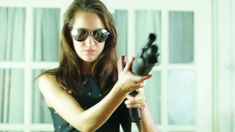 Woman assassin with a shotgun