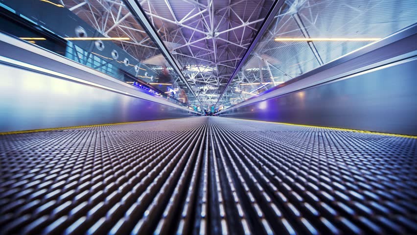 POV of moving walkway in airoprt. Timelapse.