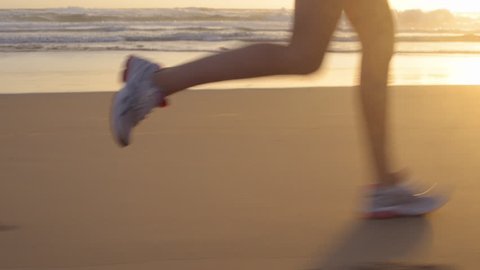 Running woman outdoors beach run