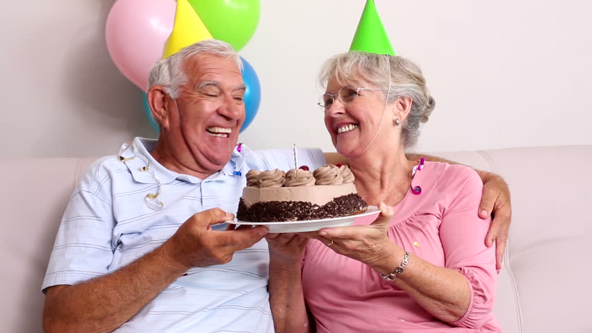 senior caucasian couple celebrating birthday on Stock Footage Video ...