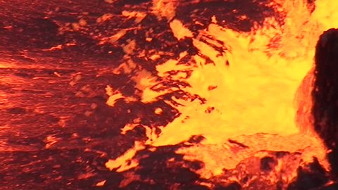 Close view to an eruption in the Erta Ale volcano lava lake