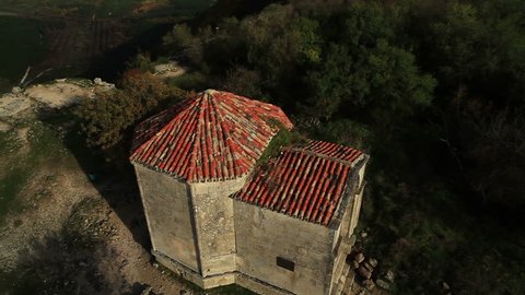 Aerial View: Chufut-Kale fortress, Mausoleum of Dzhanike-Khanym. Crimea. Chufut-Kale is a national monument of Crimean Karaite culture and Tatar fortress in Crimea. Autumn 2013