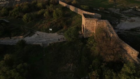 Aerial View: Chufut-Kale fortress. Mountain plateau of Burunchak, near Bakhchisaray, Crimea. Chufut-Kale is a national monument of Crimean Karaite culture and Tatar fortress in Crimea. Autumn 2013