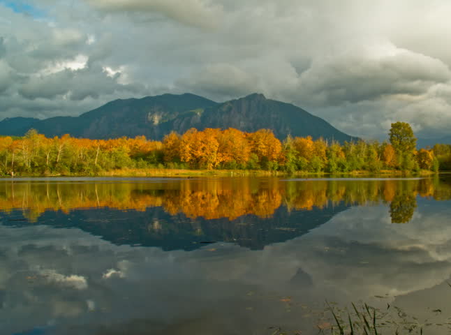 NTSC time lapse of clouds, mountains, autumn trees, and a reflection pond.  Several static treatments of footage.