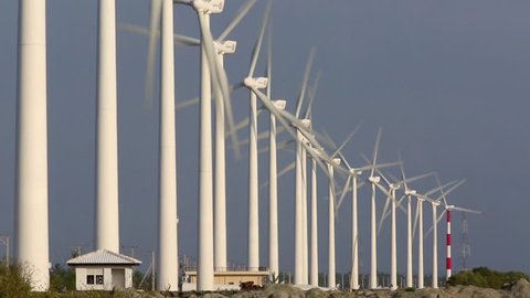 View of turbines of wind farm on the shore of Puttalam Lagoon in Sri Lanka