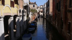 View of one of many beautiful channels of Venice, Italy.