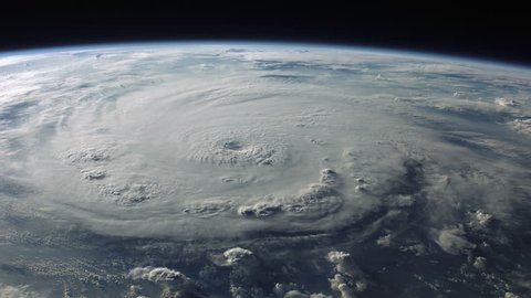 Category five hurricane churning in the sea just before making landfall. 4K broadcast quality animation. (Some elements furnished by NASA.)