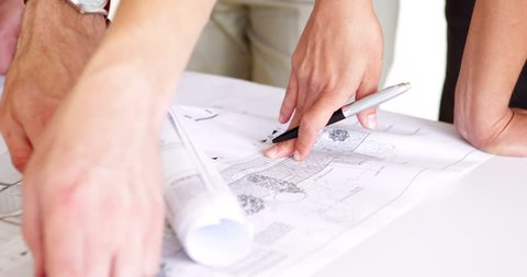 Team Architects Going Over Blueprints Office Stock Footage Video (100% ...