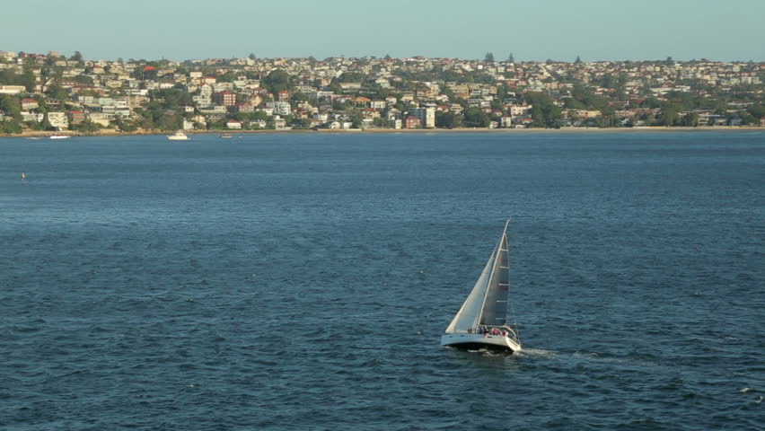 Yacht or sail boat sailing in Sydney harbour, Australia