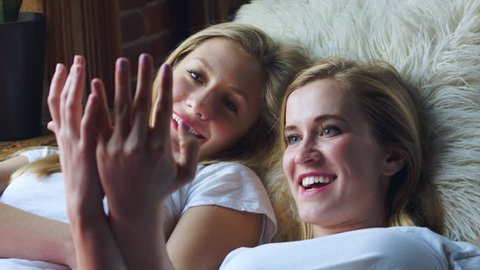 loving same sex female couple sitting Stock Footage Video (100% Royalty
