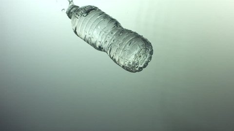 Small Water Plastic Bottle Rotates On Stock Footage Video (100