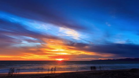 4K UHD. Beautiful scenic sunset over ocean beach in Los Angeles, California. Timelapse.