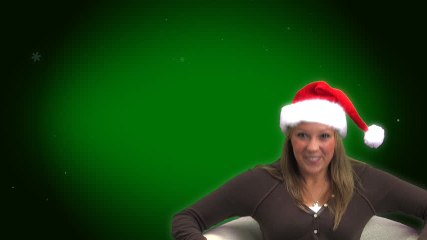 A college-aged girl in a Santa hat waves to the camera.  Ample room for your