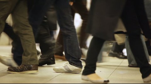 Crowd walking in subway hall in Kyoto, view on the shoes fashion diversity, Japan