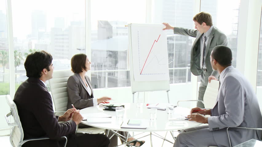 Business People in a Meeting : Video de stock (totalmente libre de regalías) 599095 | Shutterstock
