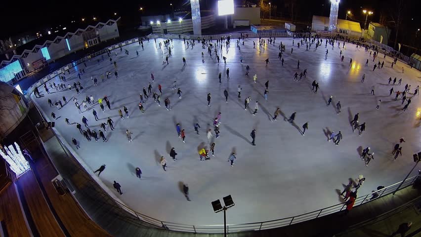 MOSCOW - NOV 23, 2013: People are skating on rink in recreational park Soko...