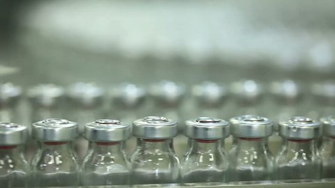 medicine bottles in pharmaceutical machine