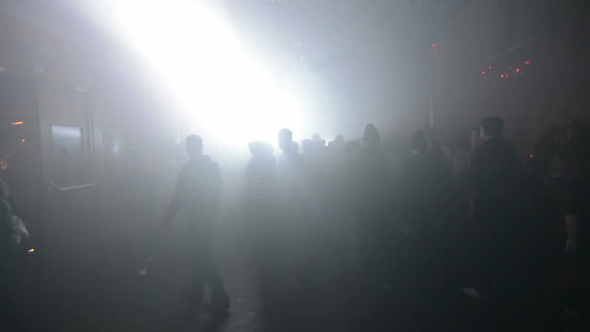 dance party. walking through live show. amazing pov shot passing through a silhouetted crowd.  Royalty-Free Stock Footage #6000854