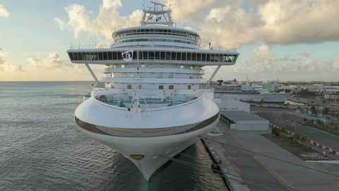 ORANJESTADT, ARUBA - DEC 2012: Time lapse of a Cruiseship leaving the harbor and moving away from another cruiseshio on December 22, 2012 in Oranjestad, Aruba