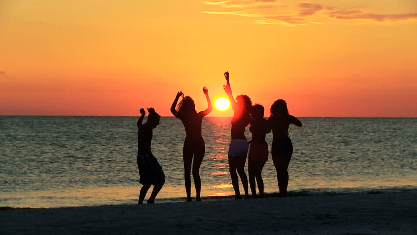 Young People in Silhouette Enjoying Stock Footage Video