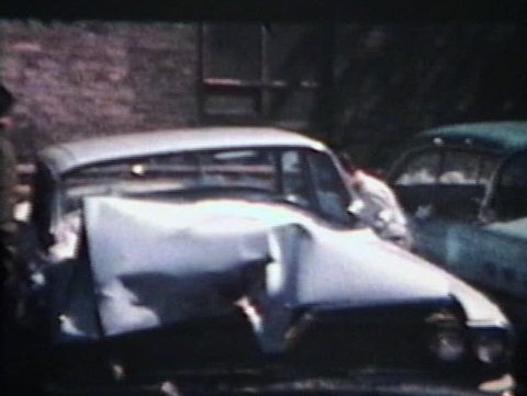 Inspecting A Smashed Up Car (1964 - Vintage 8mm film)
