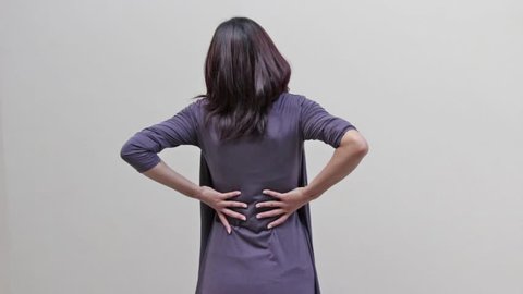 woman with backpain, spinal, waist, lower back problem, rear view
