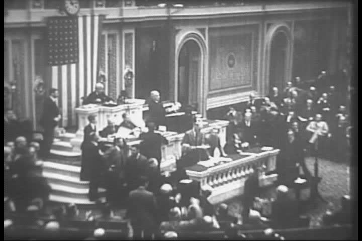 CIRCA 1930s - Franklin Delano Roosevelt addresses the nation about the Great Depression and banking crisis in 1933.
