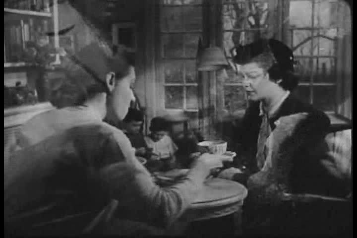 CIRCA 1950s - A mother is overprotective of her son in 1951. A friend counsels psychotherapy.