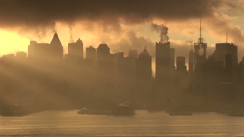 A steamy morning looking over the New York City Skyline. Dark and moody with fast moving clouds